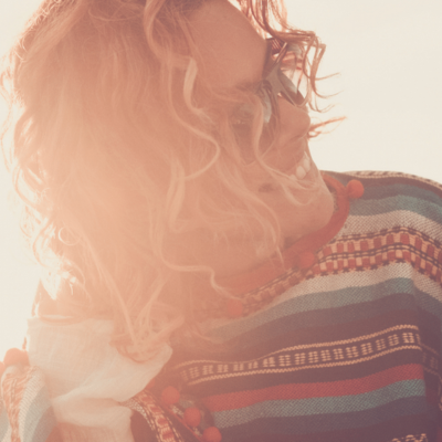Afbeelding van vrouw op het strand in de zon